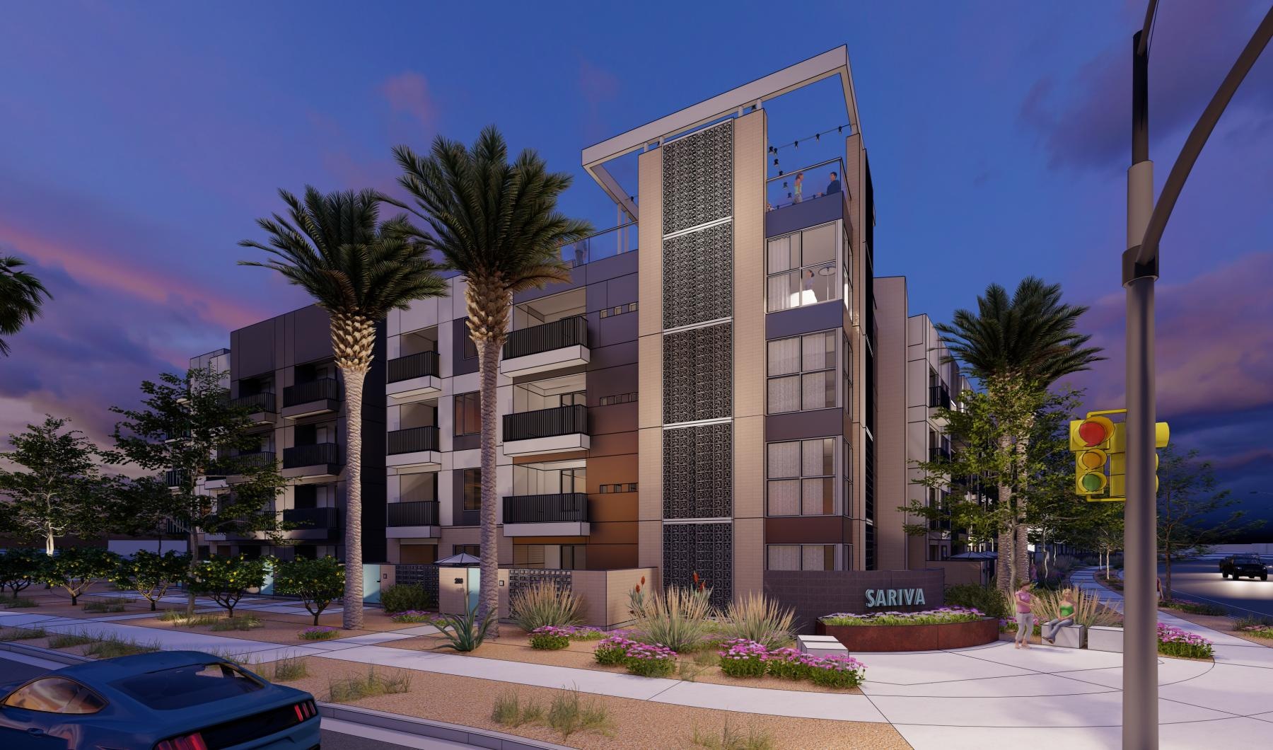 a building with palm trees and a parking lot