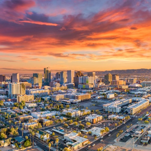 a city with a sunset
