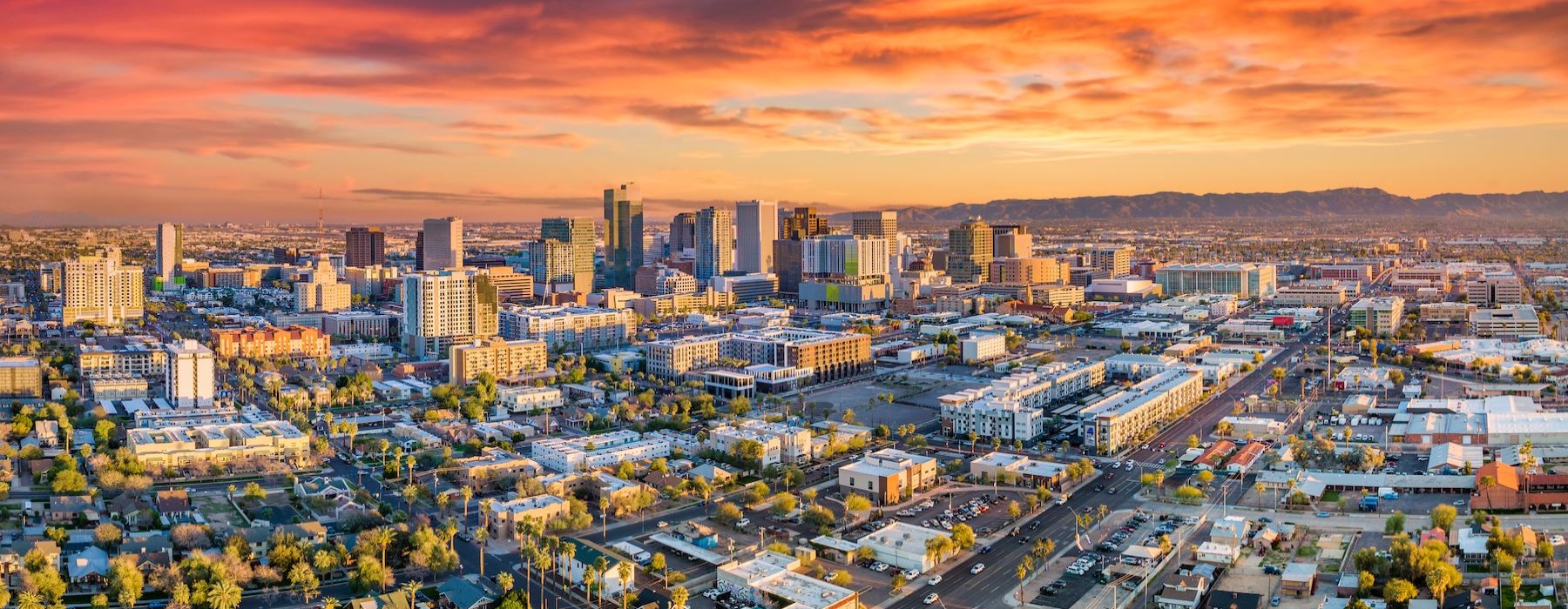 a city with a sunset