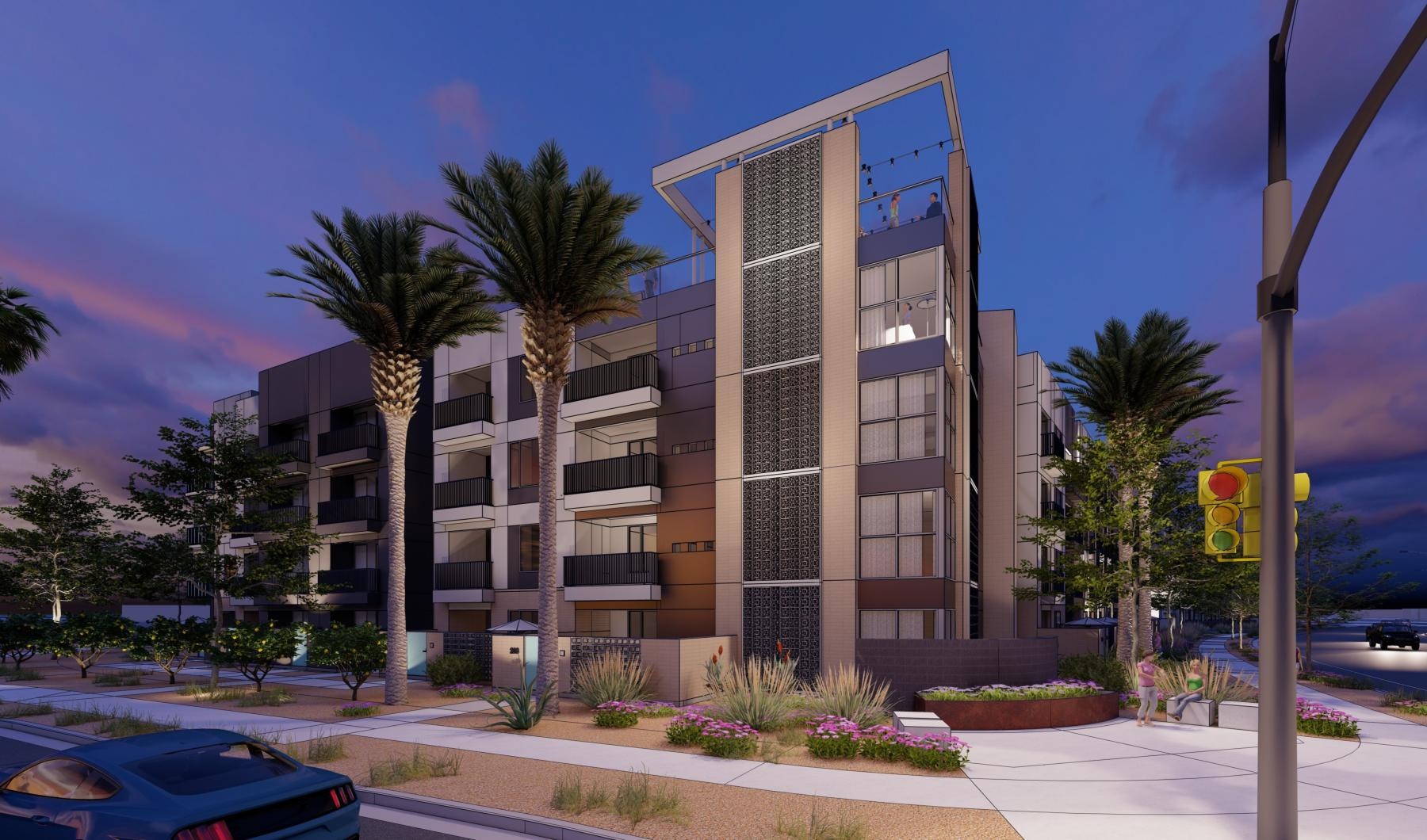 a building with palm trees and a parking lot